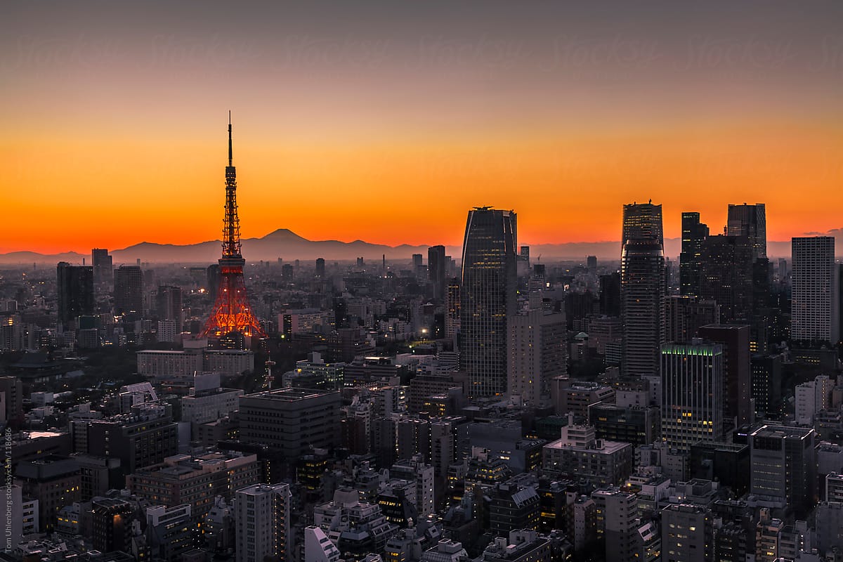 Tokyo Skyline At Sunset With Mt Fuji In The Background By Tom Uhlenberg Skyline Tokyo Stocksy United