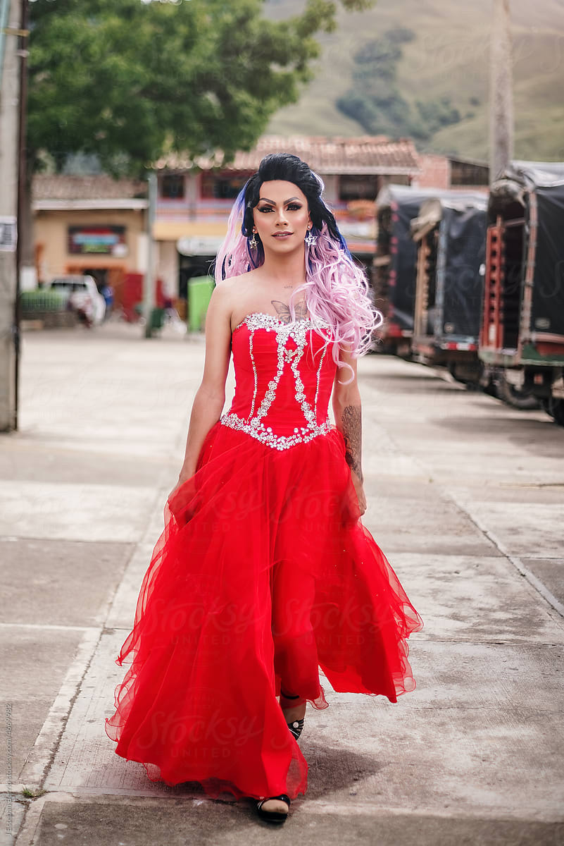 Latino drag queen modeling in the street
