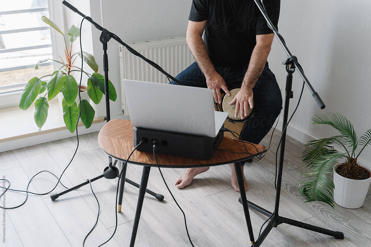 Man Recording His Musical Performance