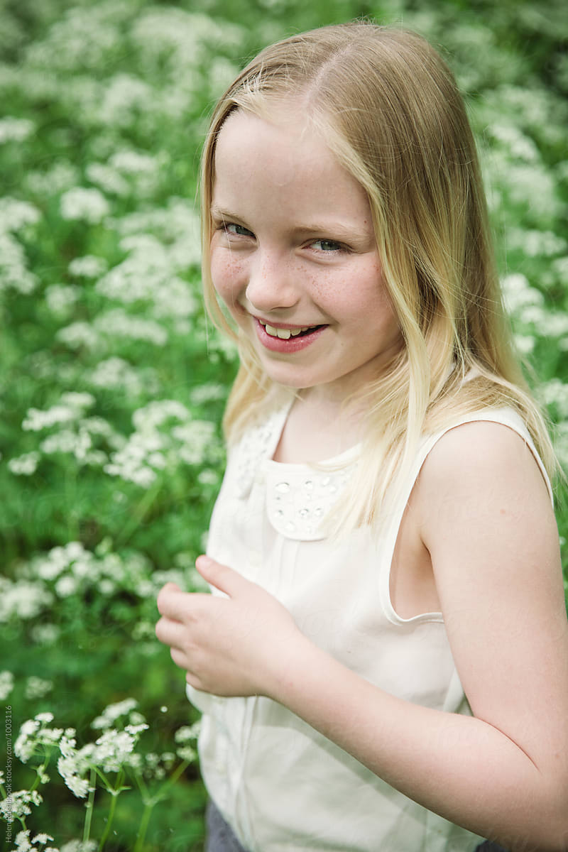 View A Smiling Little Girl Outdoors By Stocksy Contributor Helen 