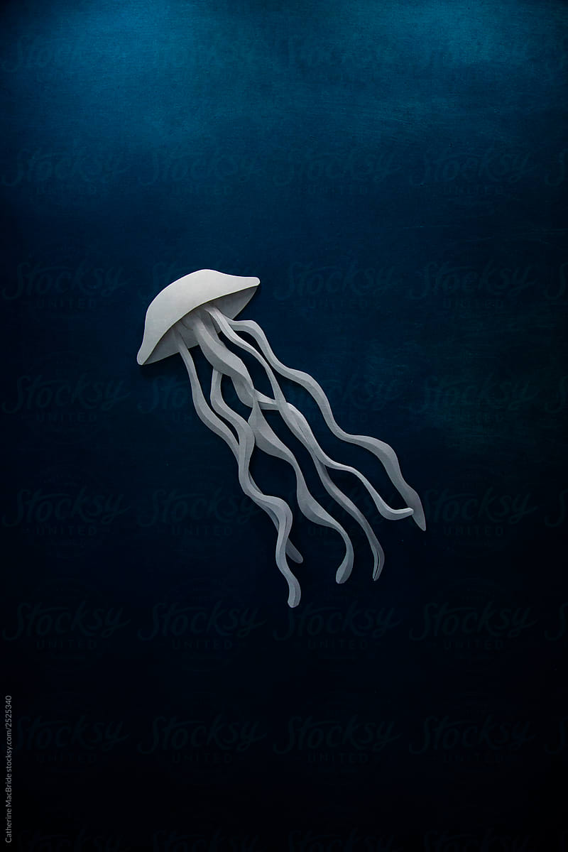 Paper Craft Jellyfish in a dark blue paper sea