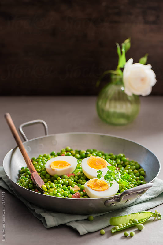 Stewed peas and boiled eggs in a saucepan