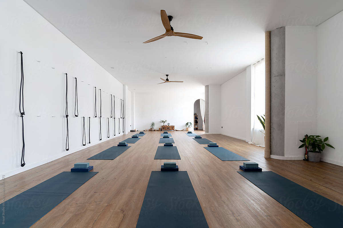 Spacious Yoga Studio With Mats And Blocks by Stocksy Contributor