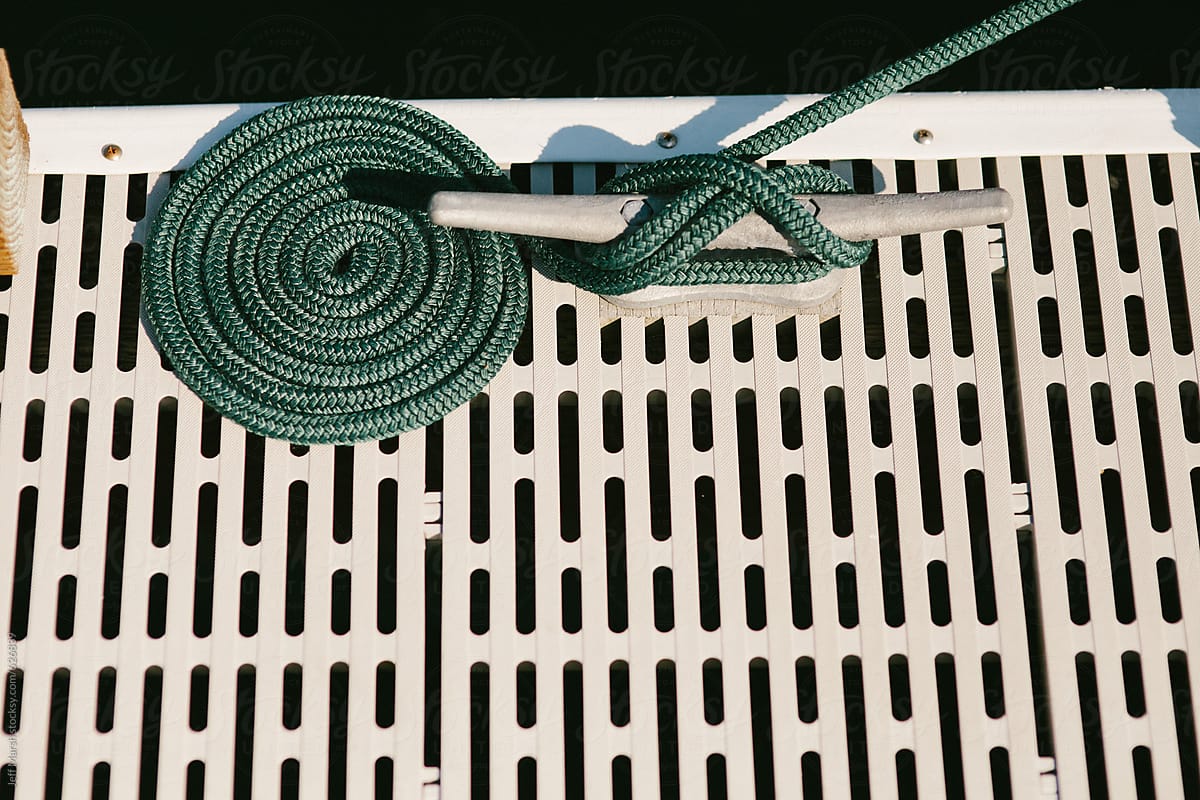 Marine rope coiled on dock