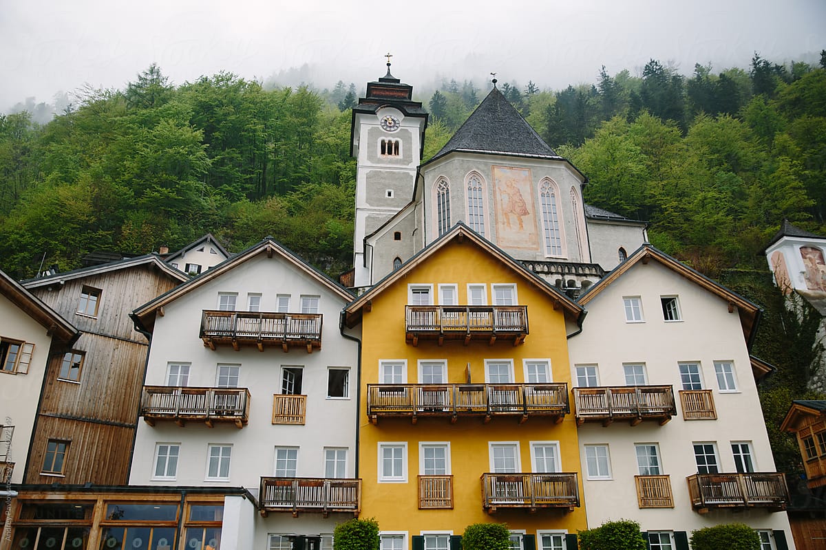 Building exterior of countryside houses and church in mountains