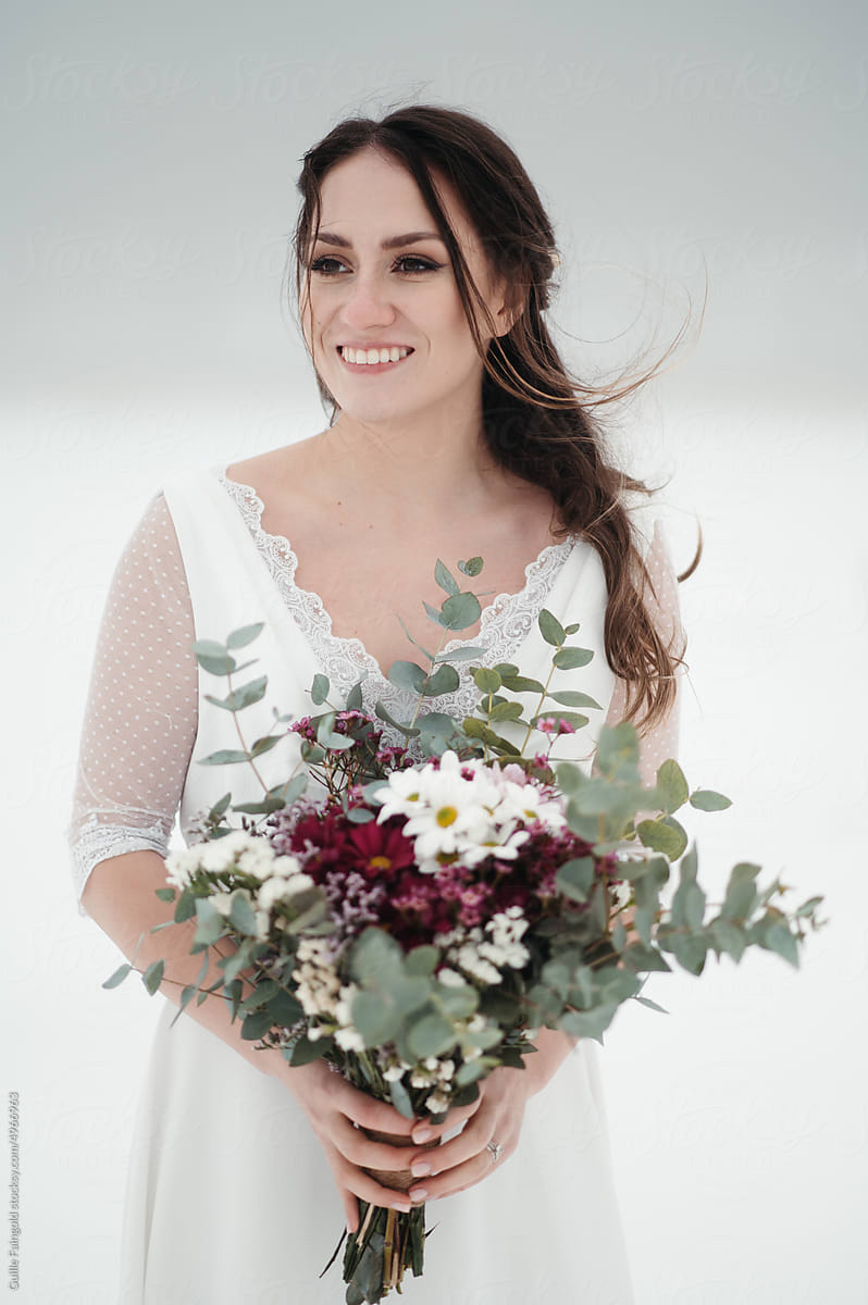 Happy bride with flowers