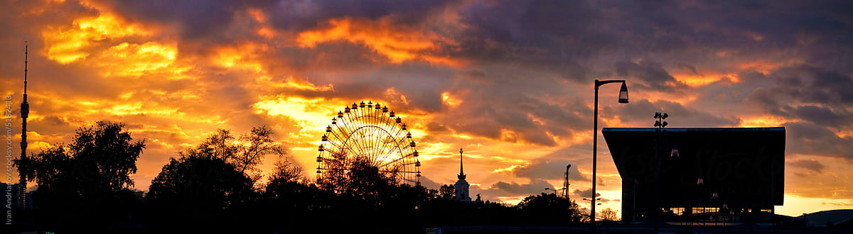 Panorama City Amusement Park At Sunset