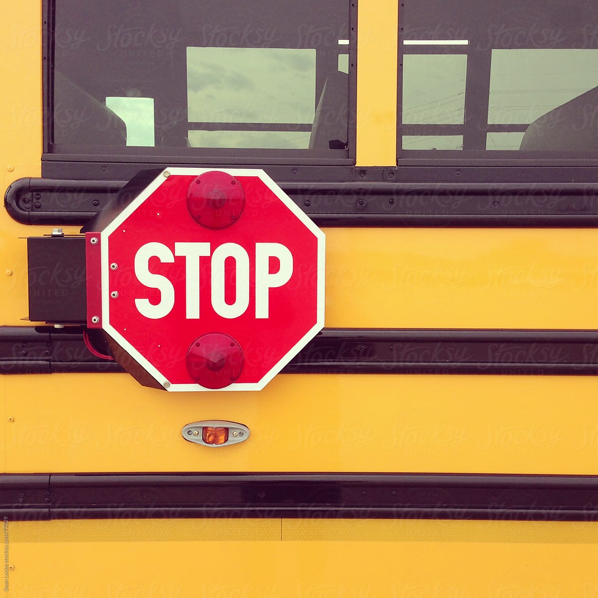 School Bus: Stop Sign on Side of Bus