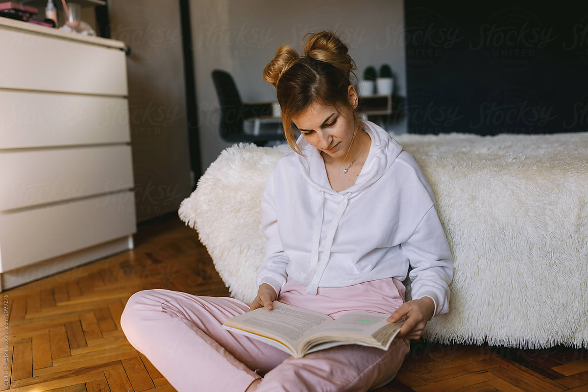 Young woman studying from home.