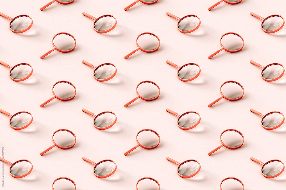 3D pattern of pink magnifying glasses.