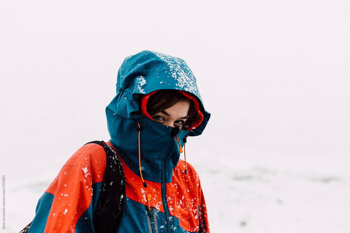 Woman With A Hood On A Mountain