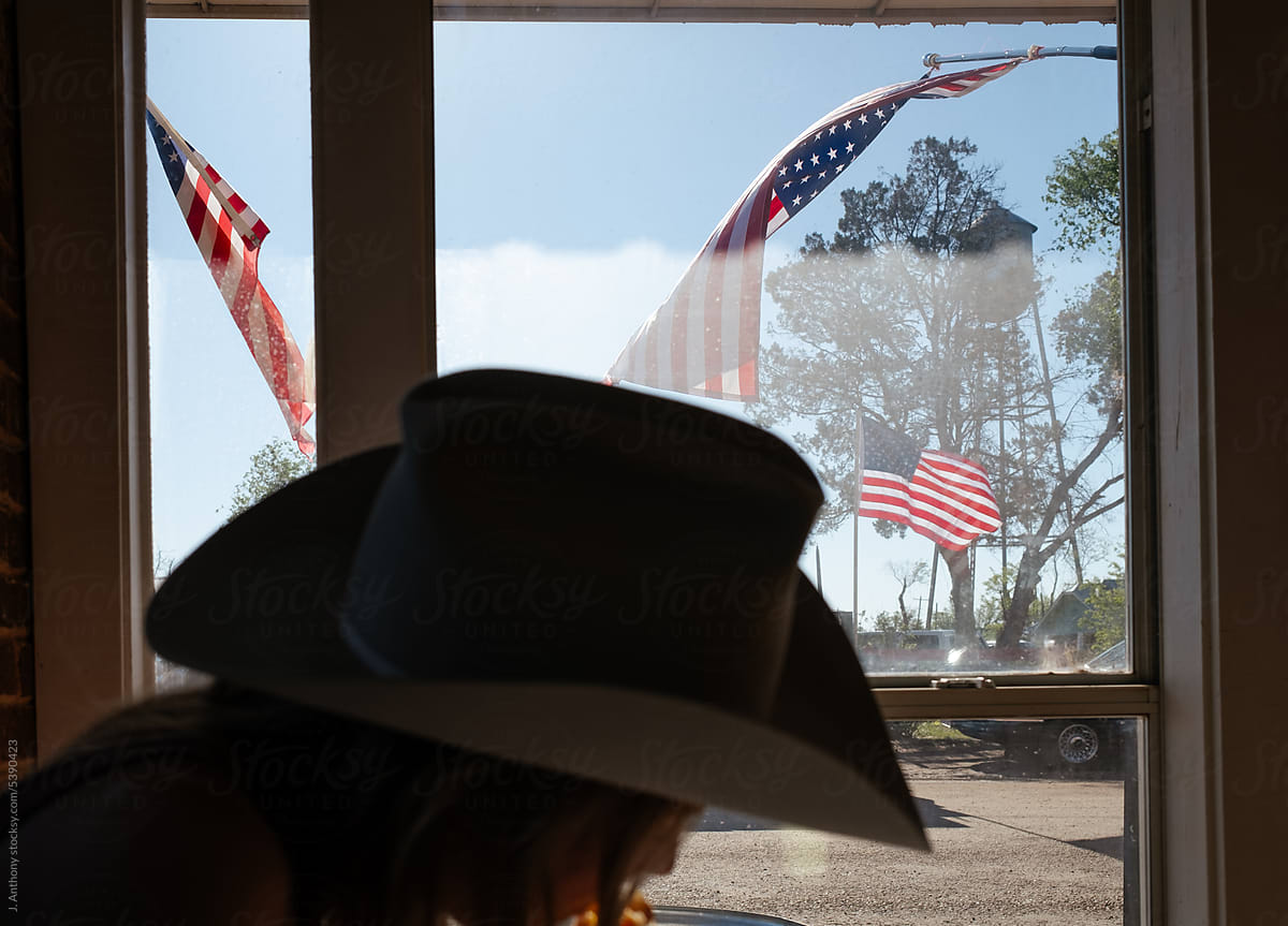 Texas Woman In Cowboy Hat With American Flags