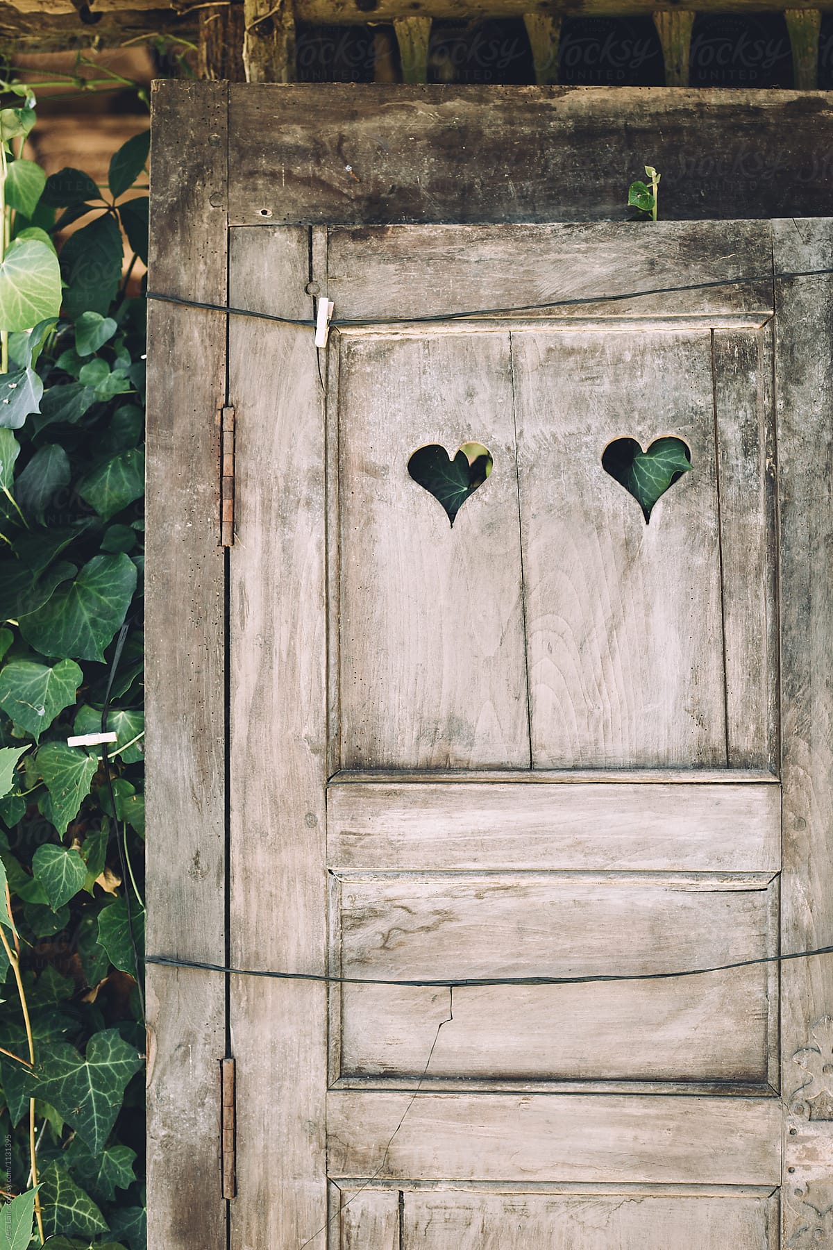 Old door with hearts
