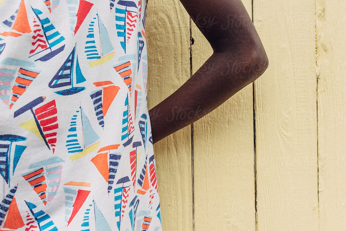 Sail boat pattern dress close-up on a black girl