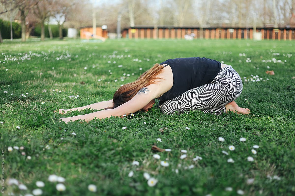 Woman Doing Yoga by Stocksy Contributor Marija Kovac - Stocksy