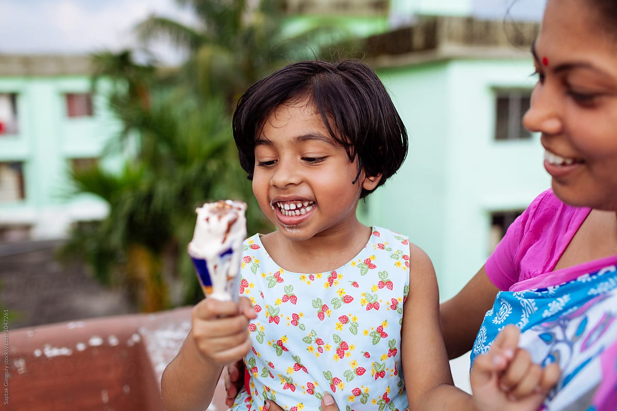 Mother And Daughter Enjoying An Ice Cream On A Hot Day By Saptak Ganguly 2236