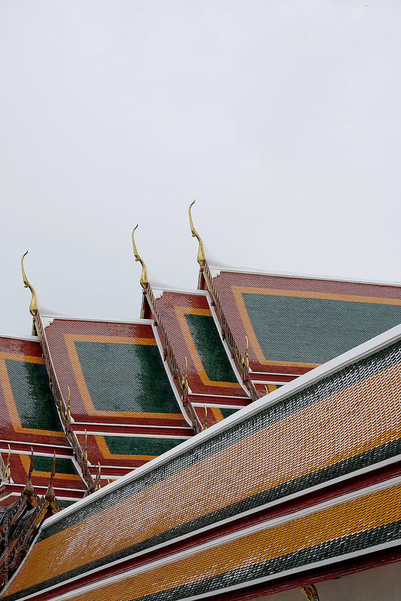 Colorful traditional Thai roof temple and clear sky