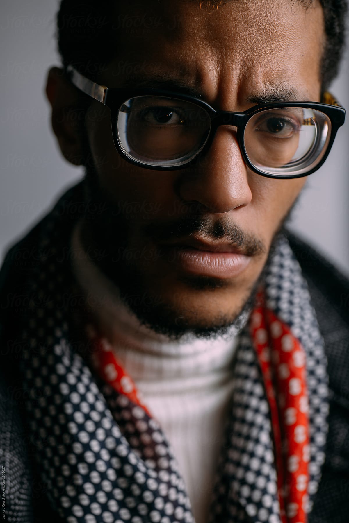 Closeup portrait of a man with glasses