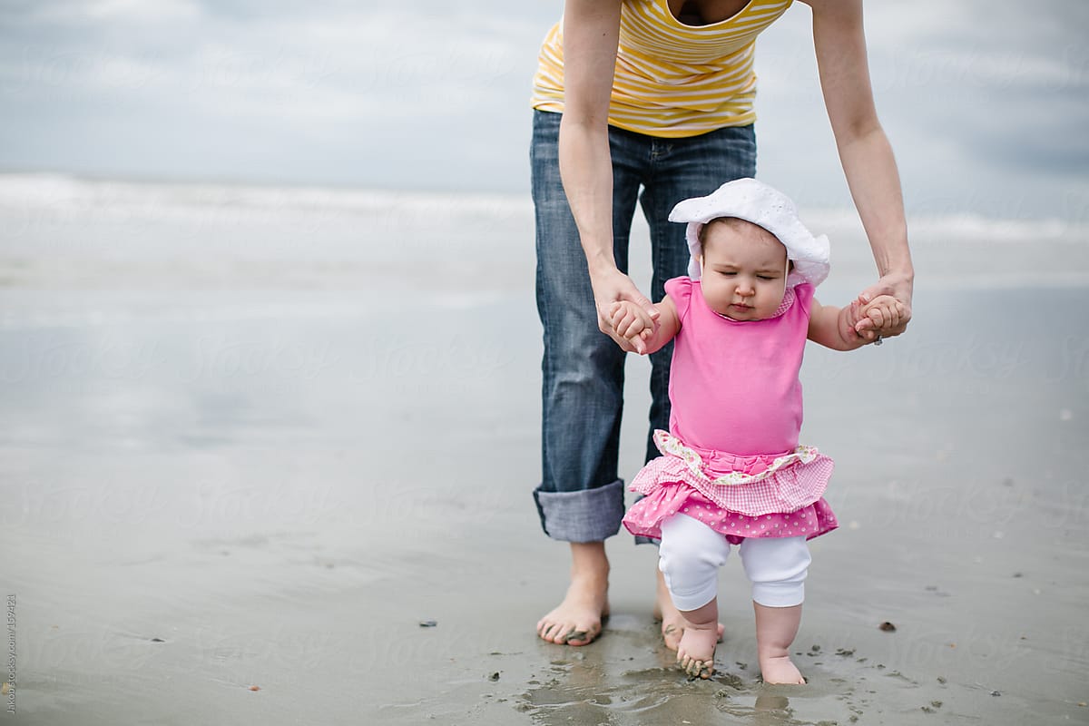 A Mother And Daughter Playing On A Beach By Stocksy Contributor Jakob Lagerstedt Stocksy