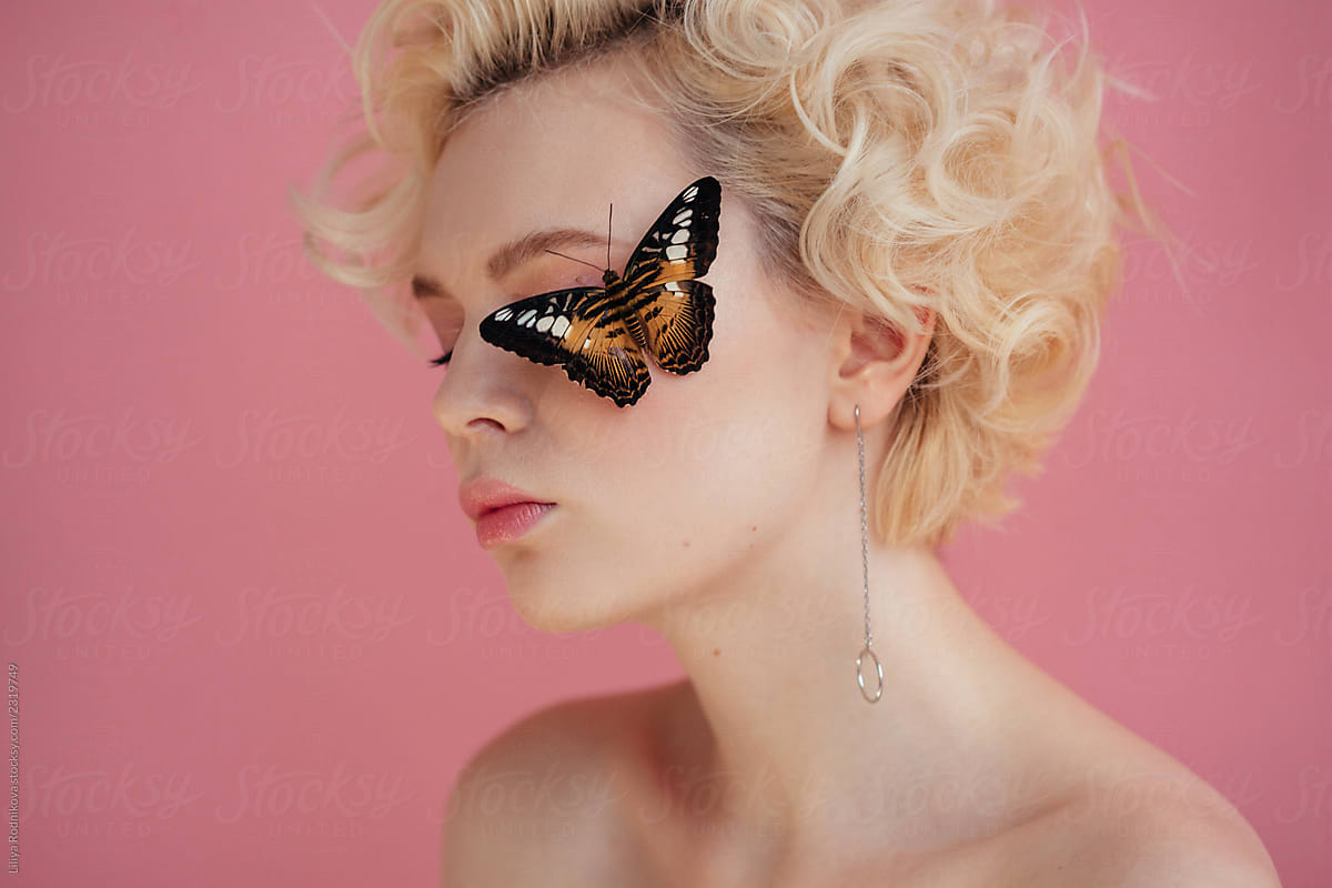Butterfly sitting on face