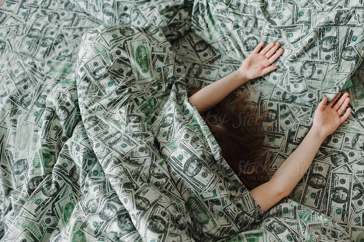 Money and human  by Oleksandra Stets for Stocksy United