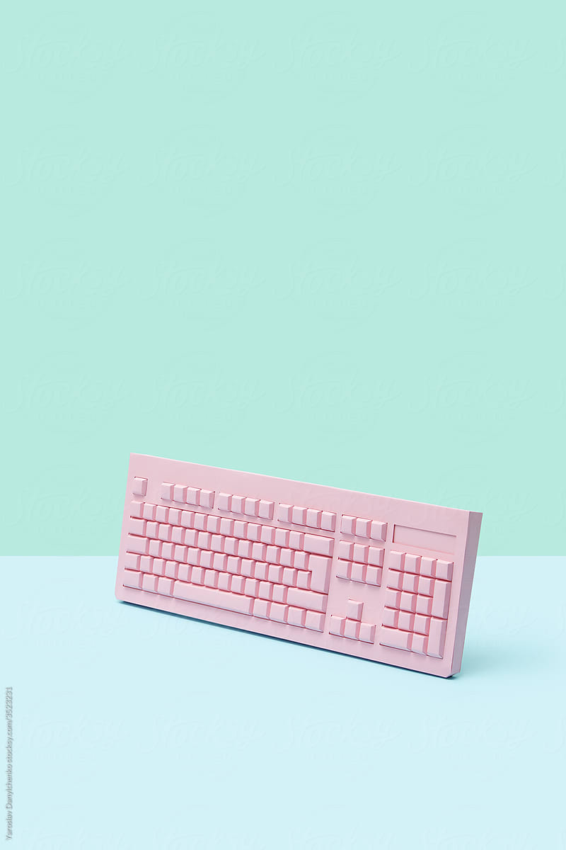 Handmade computer keypad of pink paper in studio
