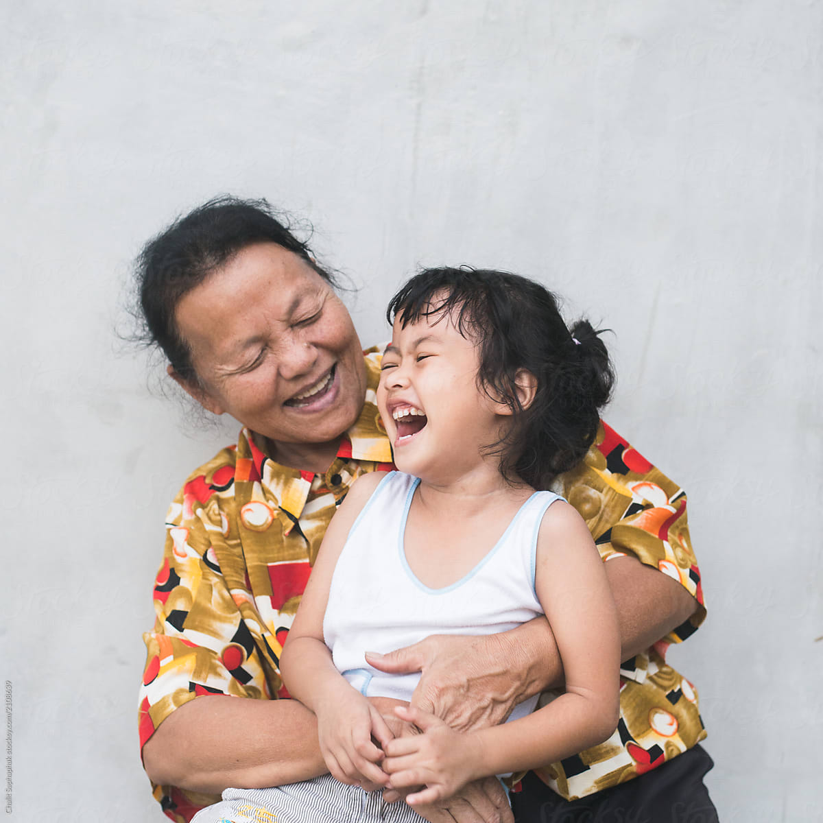 Asian Grandmother And Her Granddaughter By Stocksy Contributor 