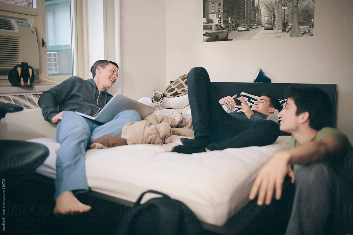 Student Roommates and Friends Hanging Out in a Bedroom in their New York Apartment