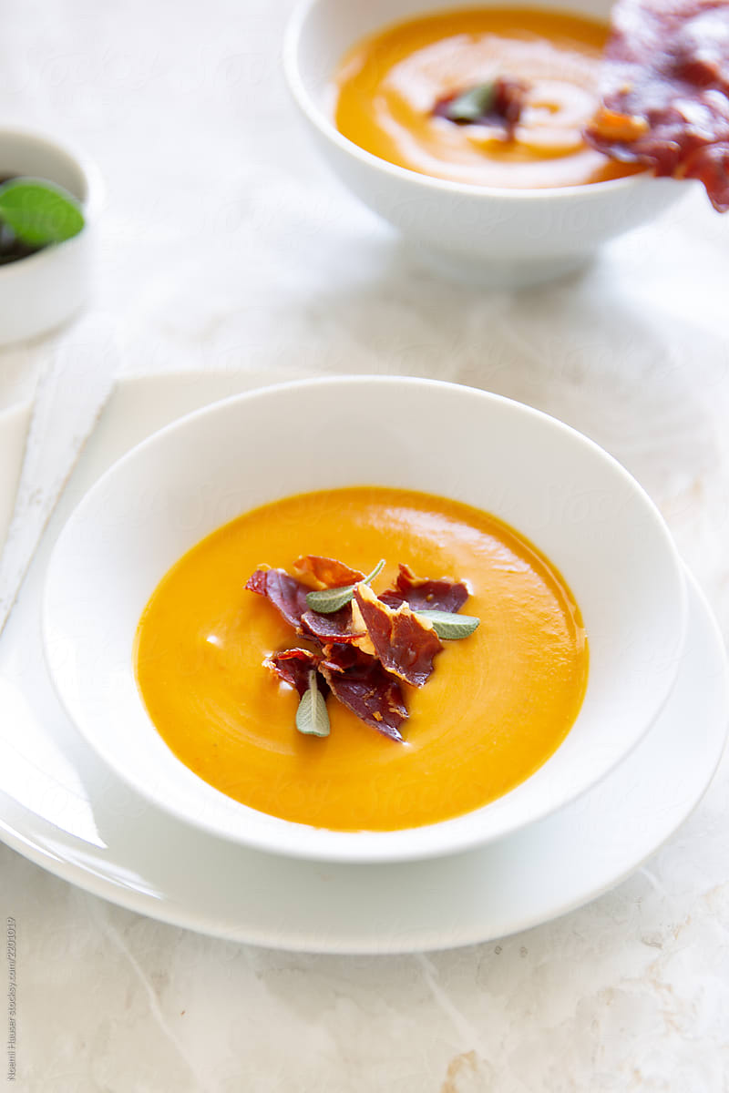 Roasted pumpkin soup with ham chips