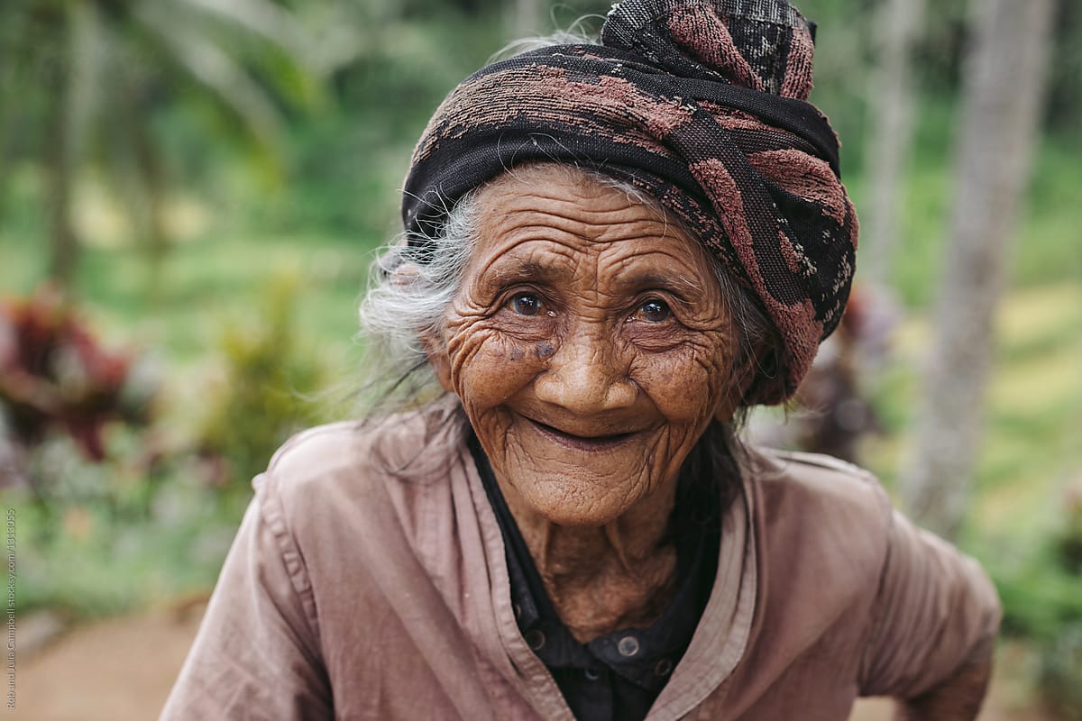 Portrait Of Old Wrinkled Balinese Woman In Nature Stocksy United