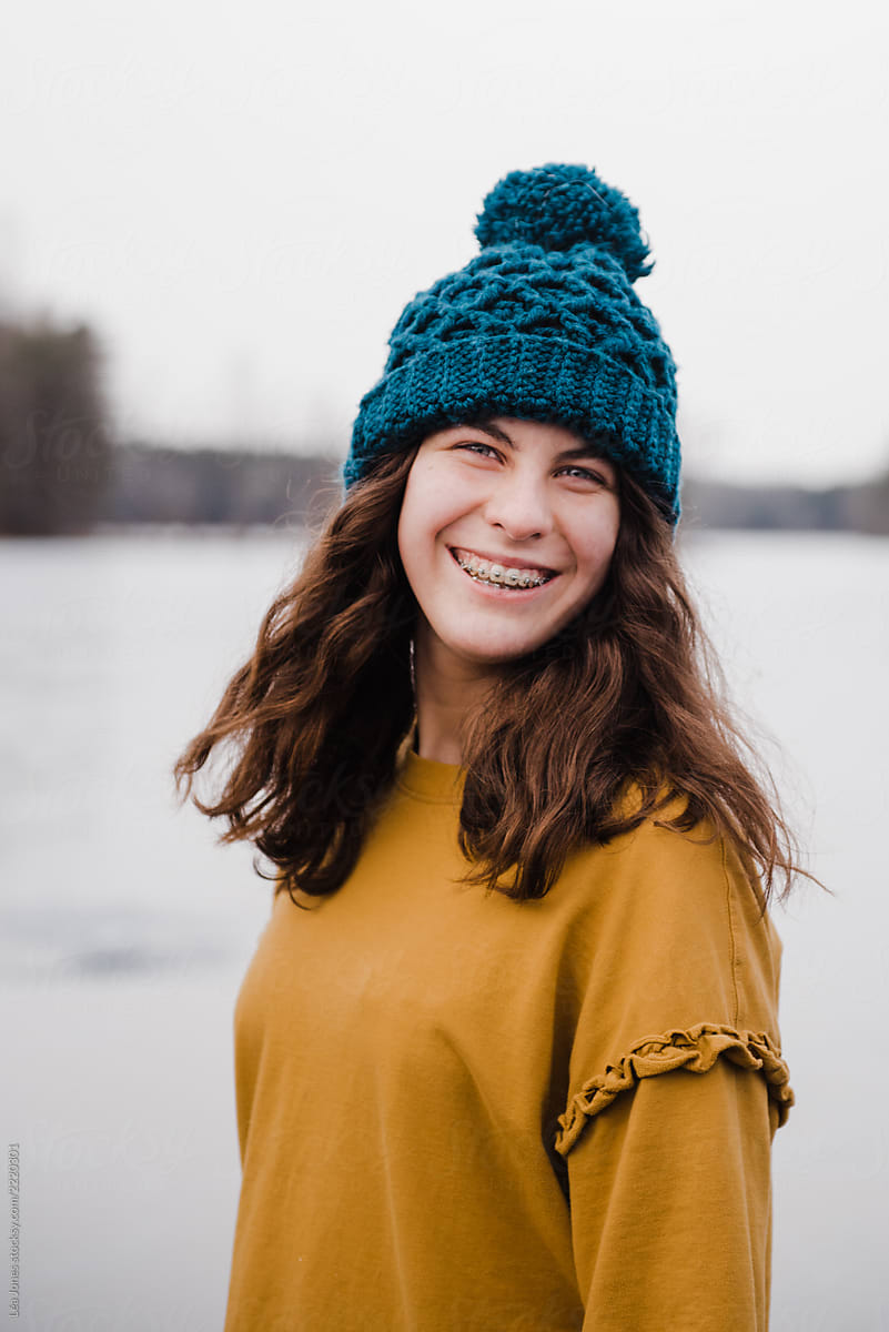 Teen Gril With Warm Hat Smiling At Camera by Léa Jones - Wool, Smile