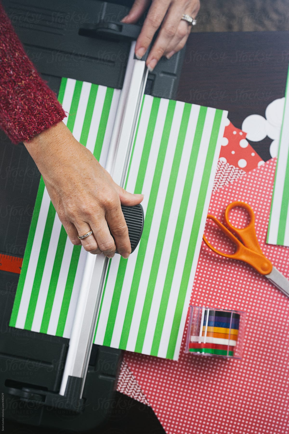 Countdown: Woman Uses Paper Cutter To Slice Patterned Paper