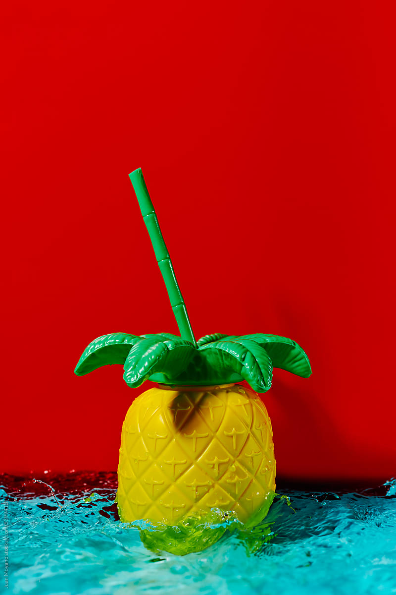 pineapple-shaped drink container on water