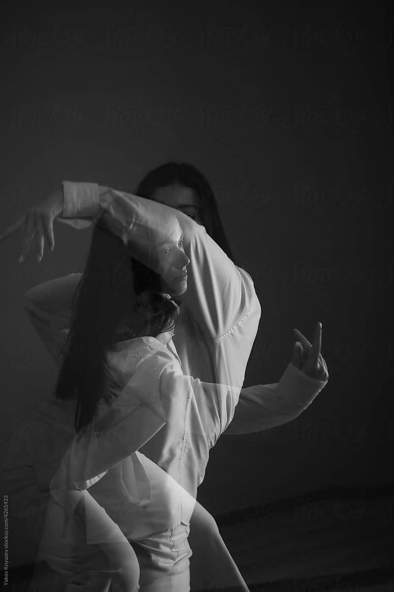 surreal bw portrait of a dancing teen girl