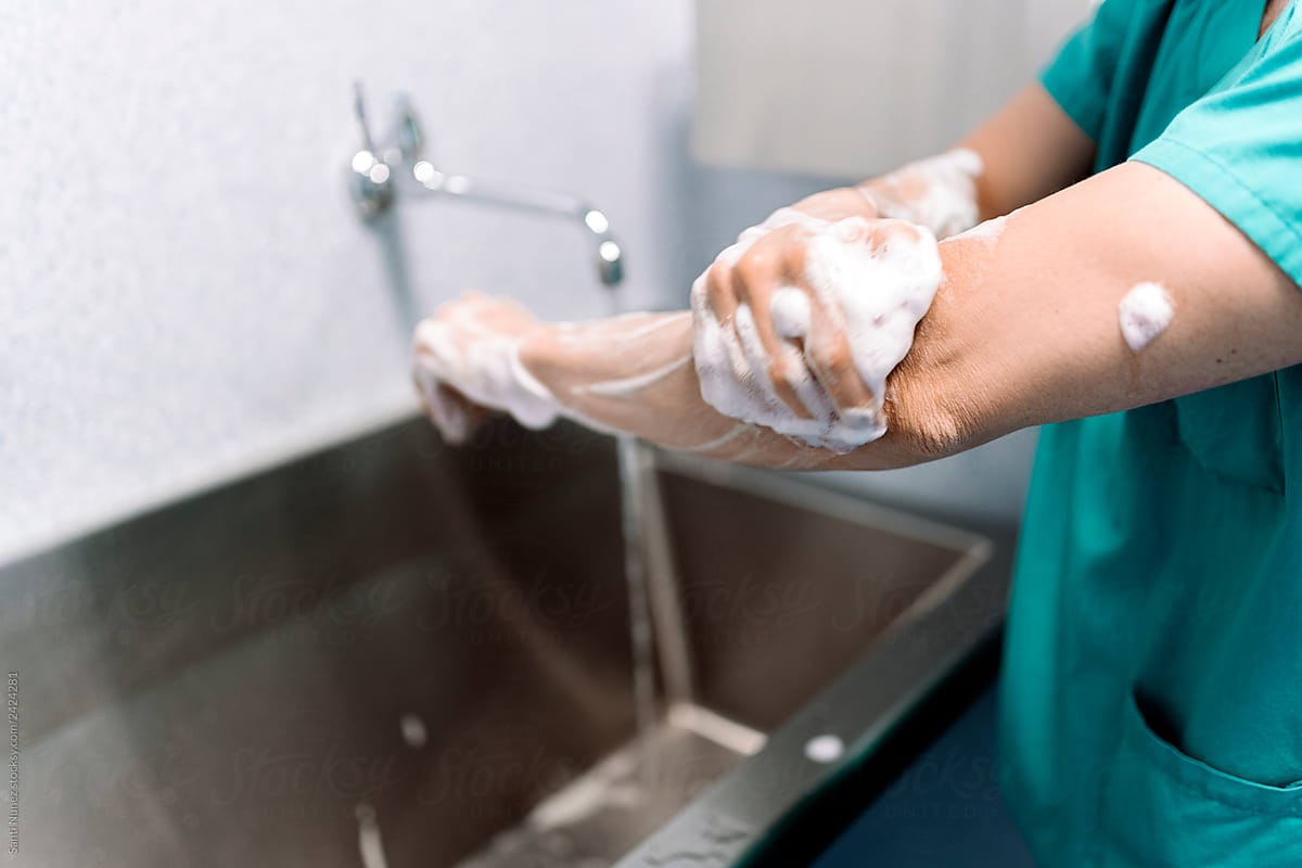 Doctor Washing Hands Before Operating