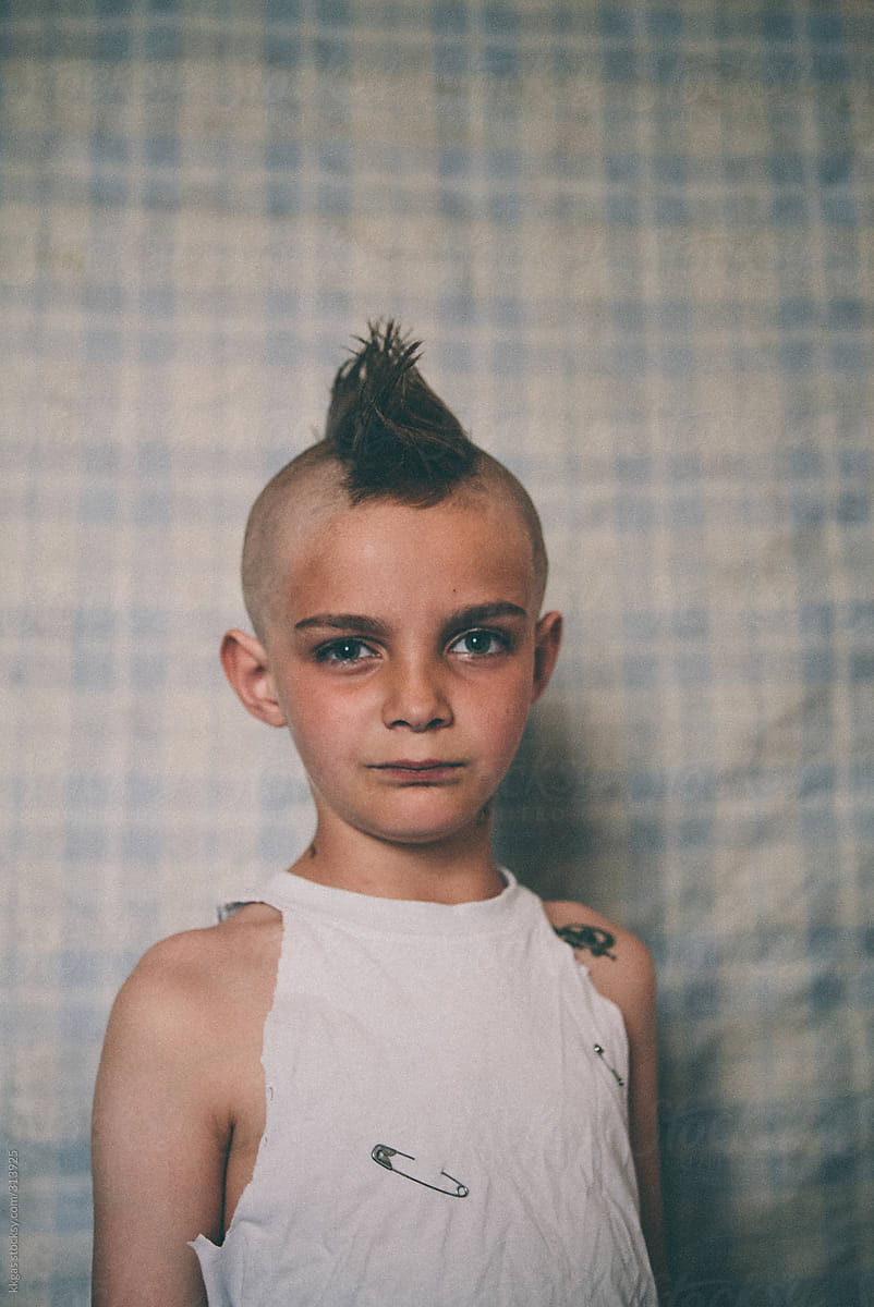 Young punk boy in his house in London