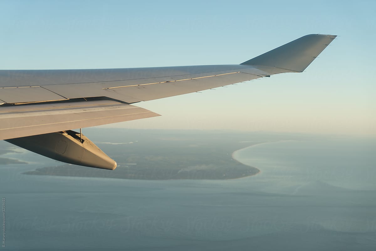 Airplane Wing Over Beautiful Landscape