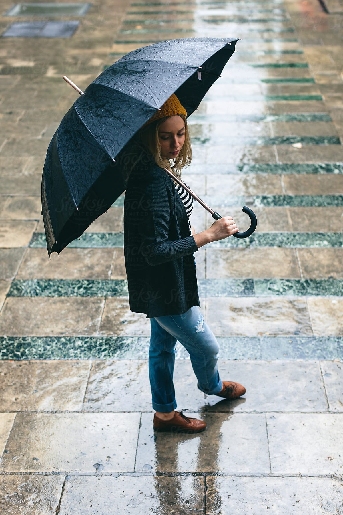 girl with umbrella in rain