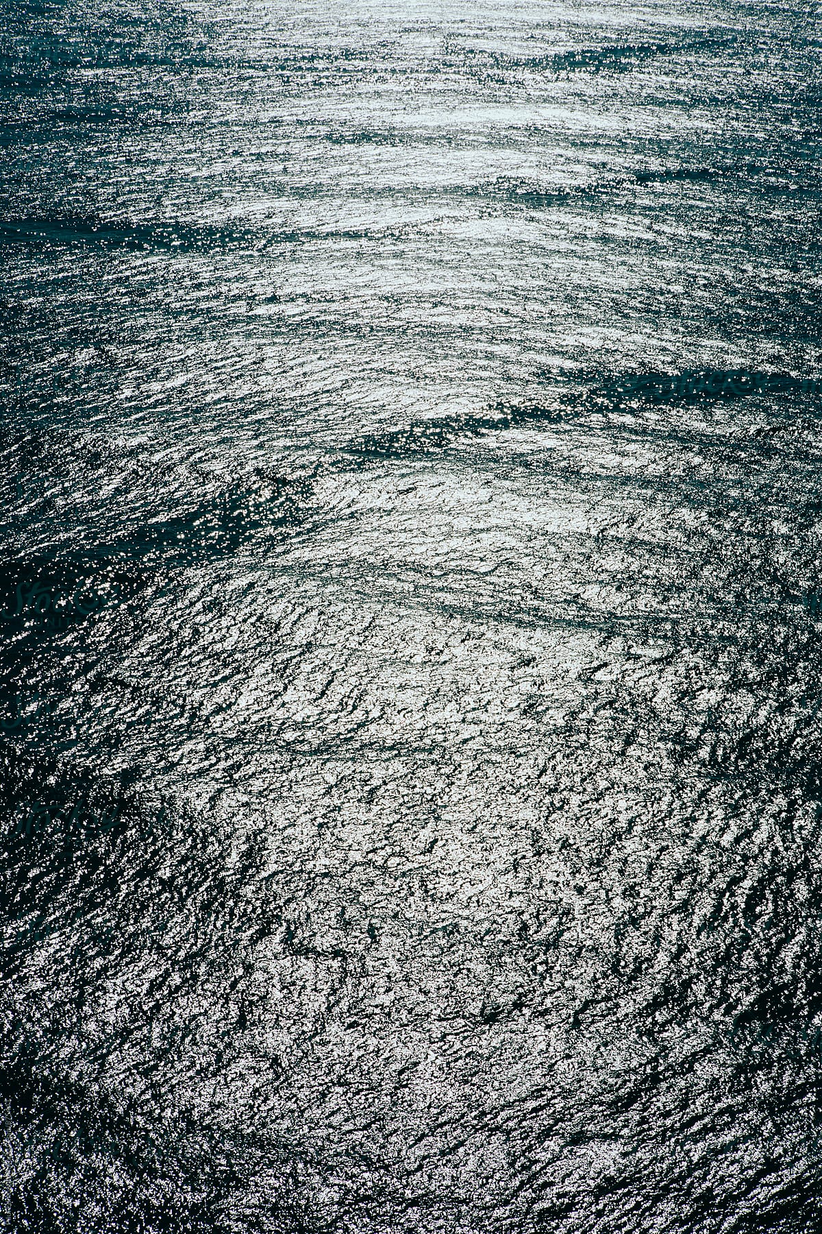 Detail of sunlight reflecting on ocean water
