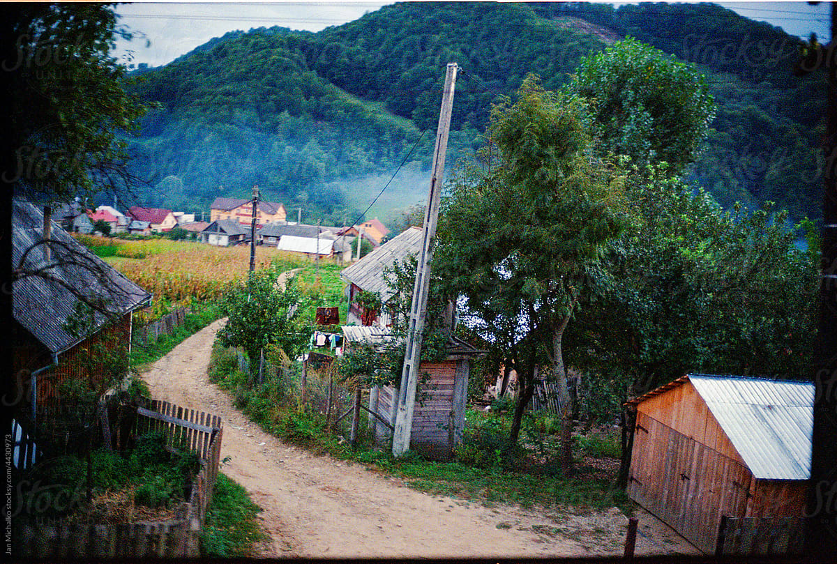 Road to a village surrounded by mountains