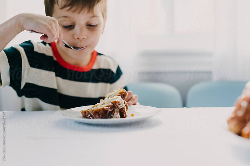 Boy eating treats he helped create