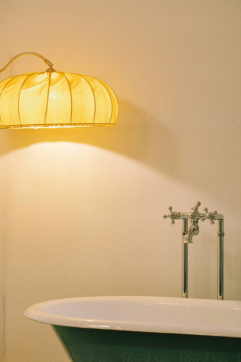 Beautiful Vintage Lamp Next to Bathtub