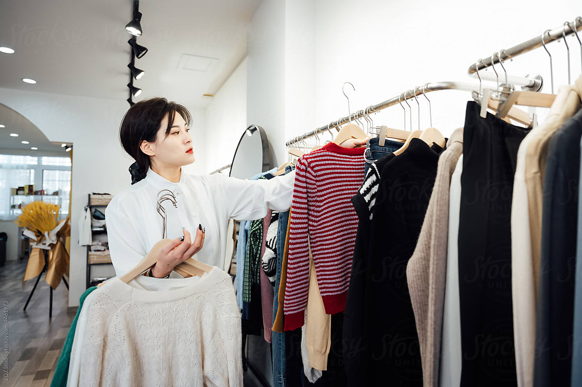 Young woman working in her clothing store