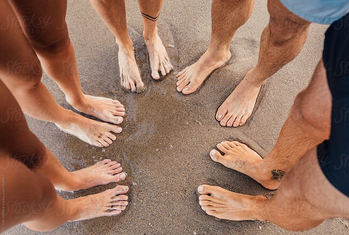Detail of feet of a group of friends