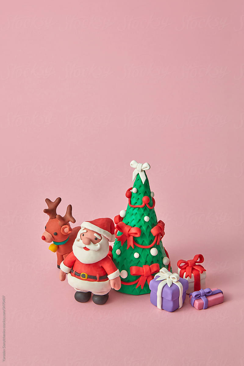 Plasticine set from Santa with deer, gifts and fir tree.