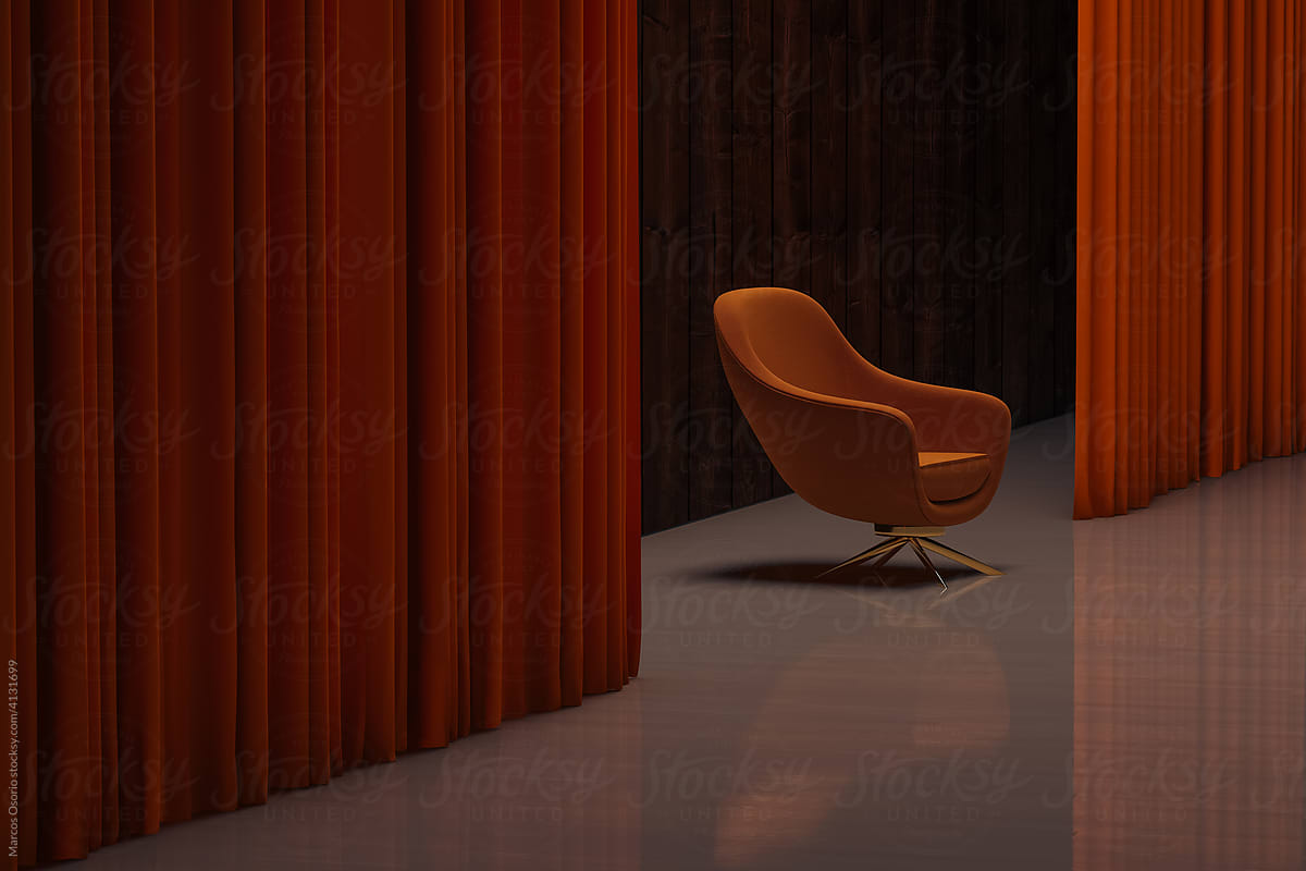 Isolated armchair in an interior between curtains