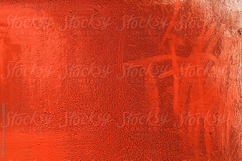Spray paint of red color tested on the wall