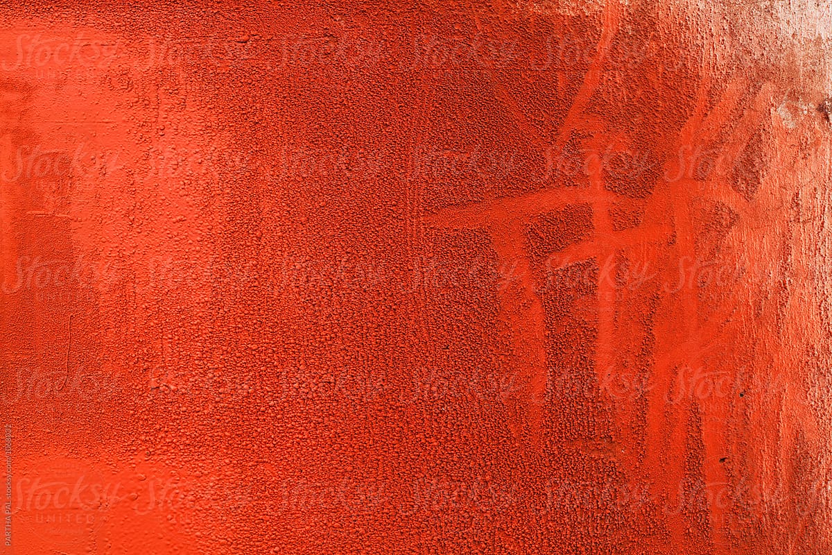 Spray paint of red color tested on the wall