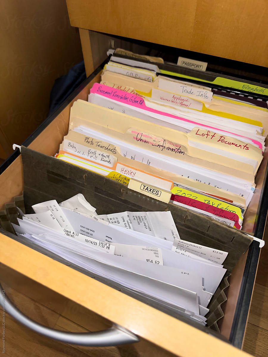 Tax Receipts  in file folder  file cabinet drawer home office