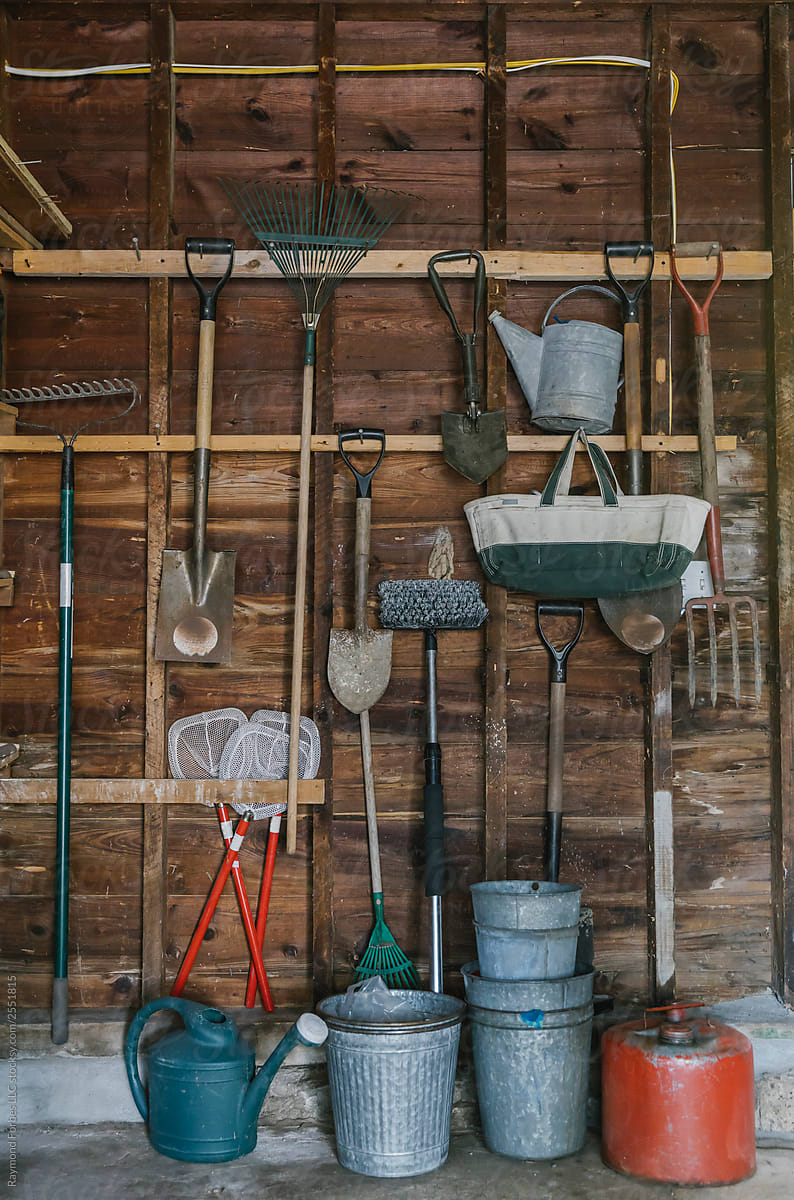Residential Garage with Tools Hanging on Wall